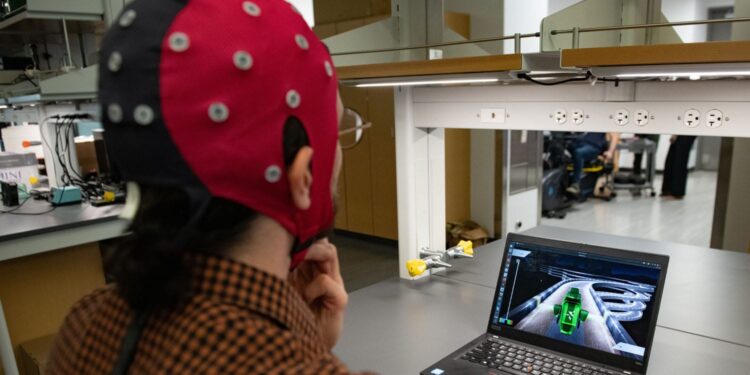 Brain-computer interface utilizes AI to adapt to users, allowing them to control video games with their thoughts